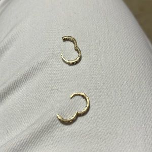 Selling 14k gold small earrings